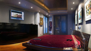 Home automation and custom home audio video tv solutions - plasma tv in bed.