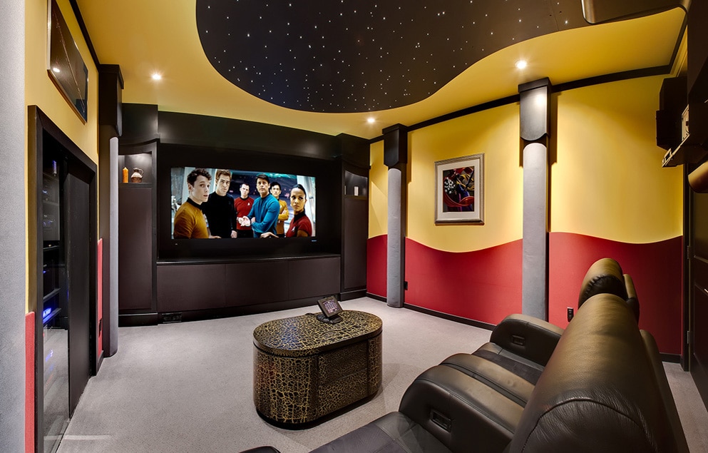 Custom home theater design and installation in Calgary with top home theatre brands for screens, speakers and seating.