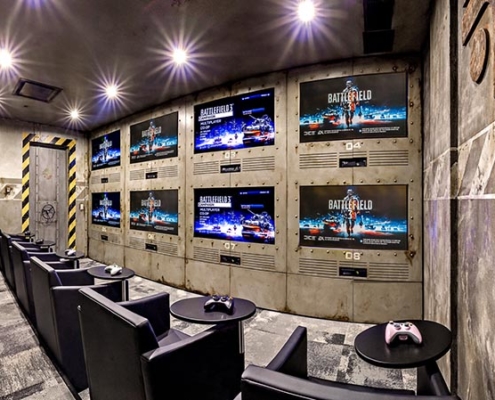 Calgary custom home theater featuring 8K TVs for an epic movie and gaming experience.